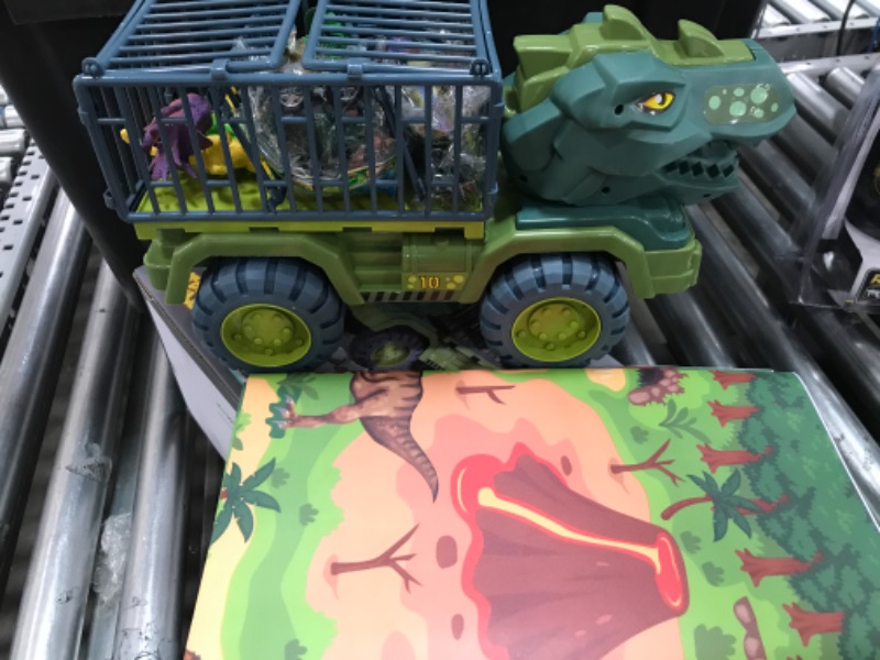 Photo 2 of CUTE STONE Dinosaur Truck, Dinosaur Transport Car Carrier Truck with Dinosaur Toys, Friction Powered Cars, Activity Playmat, Dino Car Playset Toys for Kids Boys Grils
