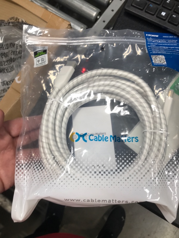 Photo 2 of Cable Matters [Ultra High Speed HDMI Certified] Braided 48Gbps 8K HDMI Cable 16.4 ft / 5m with 8K@60Hz, 4K@240Hz and HDR Support for PS5, Xbox Series X/S, RTX3080 / 3090, Apple TV and More in White 16.4 ft White