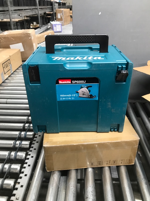 Photo 2 of ***BOX 1 of 2***NOT COMPLETE***
TESTED- POWERS ON*** Makita SP6000J1 6-1/2" Plunge Circular Saw Kit, with Stackable Tool case and 55" Guide Rail, Blue Saw w/ guide rail