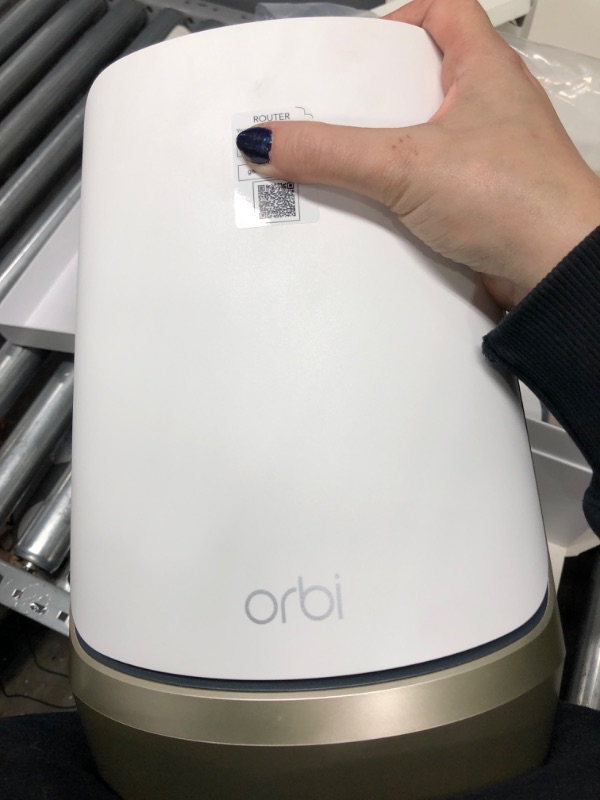 Photo 7 of ***OPENED, APPEARS OTHERWISE NEW*** NETGEAR Orbi Quad-Band WiFi 6E Mesh System (RBKE963), Router with 2 Satellite Extenders, Coverage up to 9,000 sq. ft, 200 Devices, 10 Gig Internet Port, AXE11000 802.11 Axe (Up to 10.8Gbps) WiFi 6E | 3-Pack