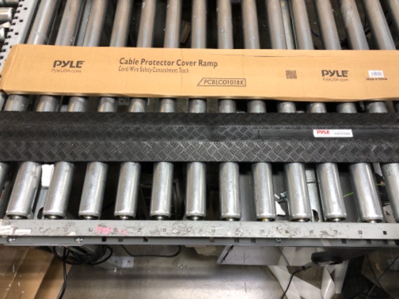 Photo 2 of Durable Cable Protection Ramp Cover - Supports 11000lbs Single Channel Heavy Duty Hose and Cord Track Floor Protection, 39.4” x 5.11” x 0.78” Cable Concealer for Indoor Outdoor Use - Pyle PCBLCO101BK