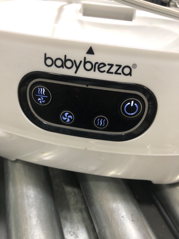 Photo 3 of Baby Brezza Baby Bottle Sterilizer and Dryer Advanced – Electric Steam Sterilization Machine – Universal Sterilizing for All Bottles: Plastic + Glass + Pacifiers + Breast Pump Parts - HEPA Filtration
