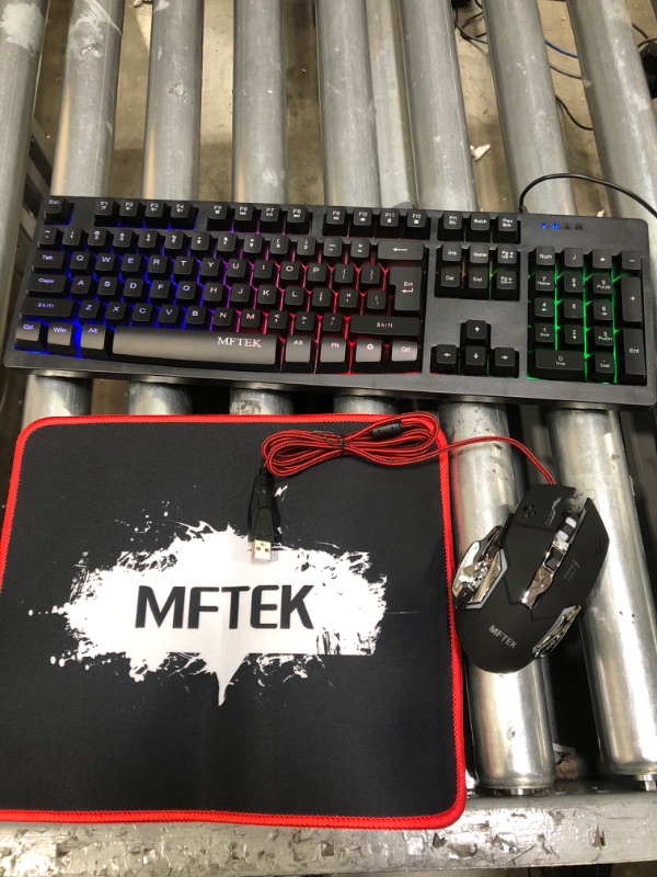 Photo 2 of Rainbow Gaming Keyboard and Mouse Combo, MFTEK Wired RGB Backlit Gaming Keyboard and 4 Color Lighted Gaming Mouse Set with Mouse Pad for Computer PC Gamer Laptop Work