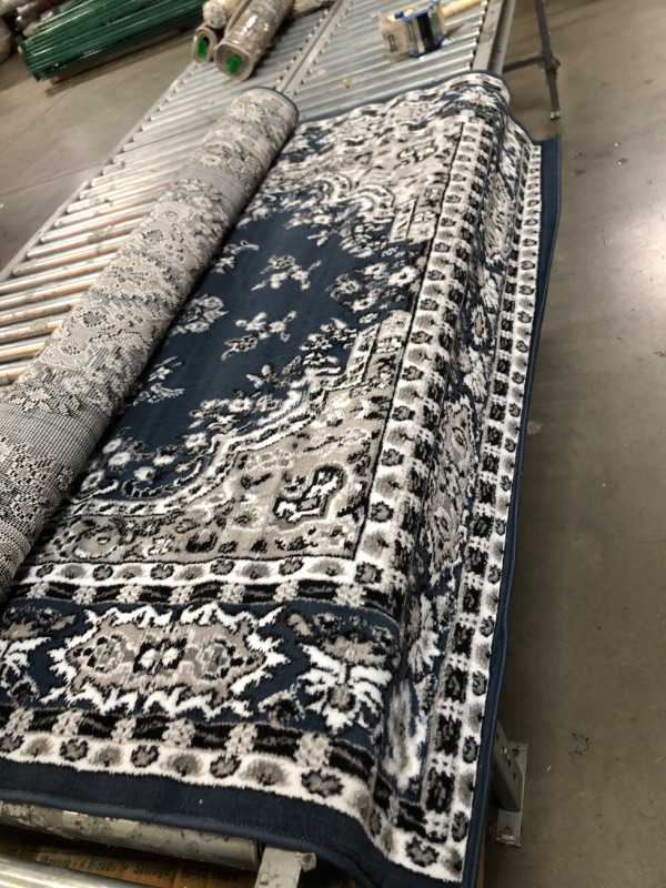 Photo 1 of ***USED,DIRTY**
BLUE,WHITE,BLACK PREMIUM RUG 5'2" X 7'4" 