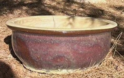 Photo 1 of LARGE HEAVY OUTDOOR POTTERY 19” x 8”
