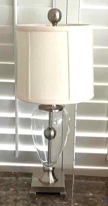 Photo 1 of CHROME AND GLASS TABLE LAMP W CREAM LINEN SHADE H28”