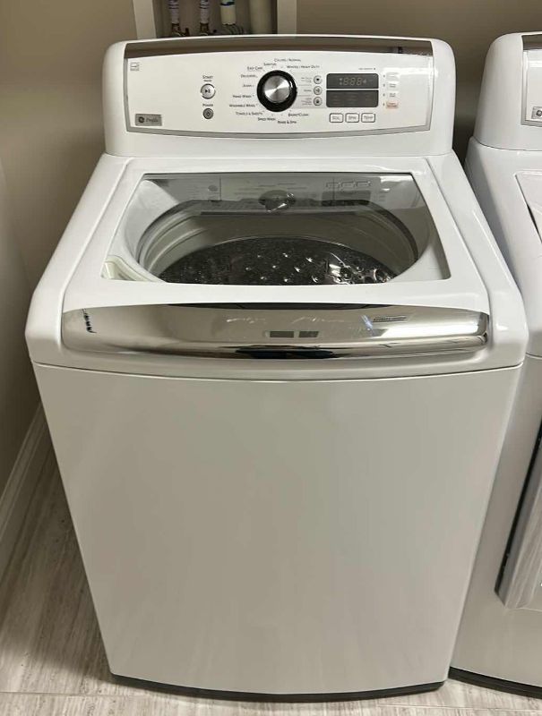 Photo 1 of GE PROFILE TOP LOADING WASHING MACHINE