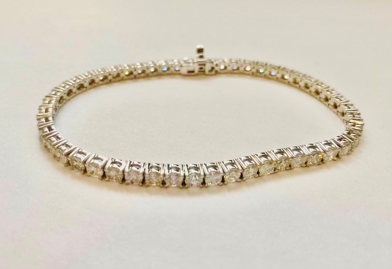 Photo 1 of 14K WHITE GOLD. W 7.5cwt DIAMOND TENNIS BRACELET 12.5 TTL G #5 EST VALUE $40,250