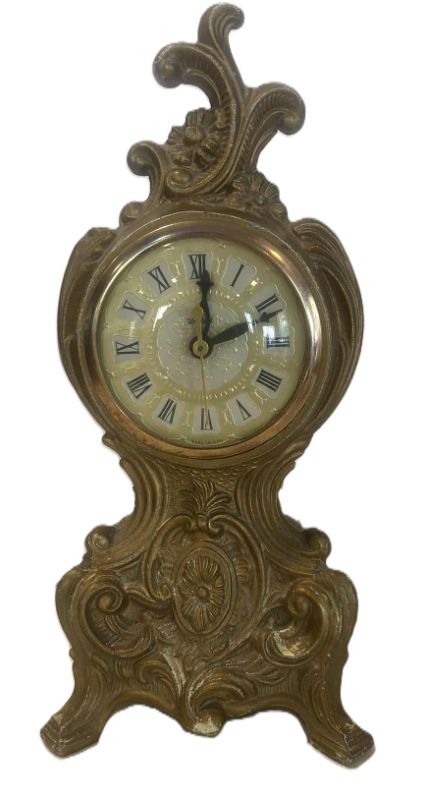 Photo 1 of VINTAGE GOLD TONE CLOCK H12.25”