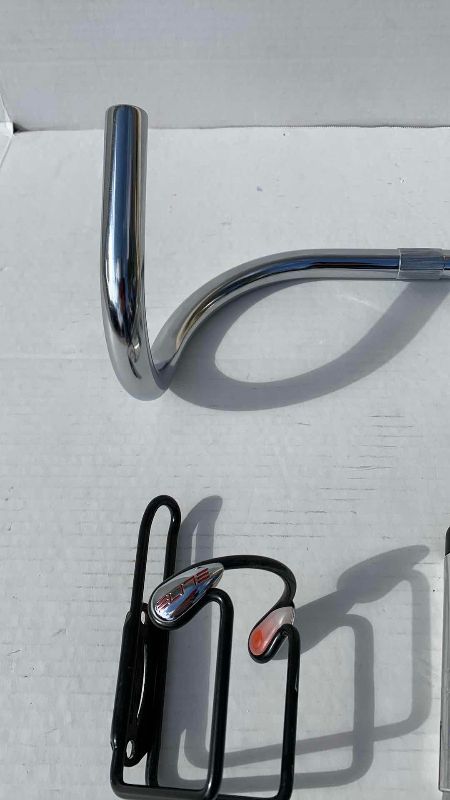 Photo 1 of BICYCLE HANDLEBARS, STEM, AND 2-CUP HOLDERS