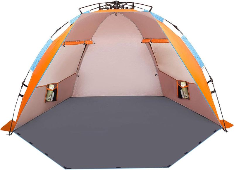 Photo 1 of Oileus X-Large 4 Person Beach Tent Sun Shelter - Portable Sun Shade Instant Tent for Beach with Carrying Bag, Stakes, 6 Sand Pockets, Anti UV for Fishing Hiking Camping, Waterproof Windproof, Orange