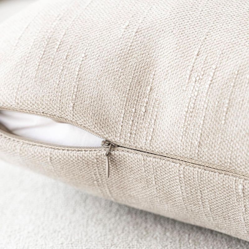 Photo 1 of Foindtower Pack of 2 Soft Textured Throw Decorative Pillow Covers Square Accent Solid Cushion Cover Cozy Farmhouse Pillow Case with Zipper for Couch Sofa Bedroom Living Room 20x20 Inch, Light Beige