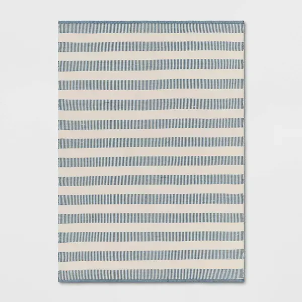 Photo 1 of 5'x7' Rectangular Hand Made Woven Outdoor Area Rug Striped Ivory/Blue - Threshold™ Designed with Studio McGee
