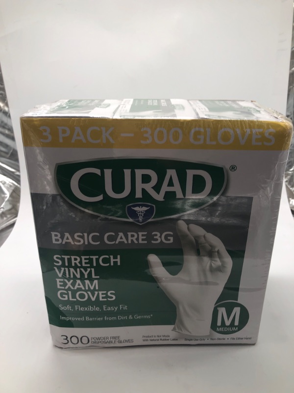 Photo 2 of Basic Care 3G Stretch Vinyl Exam Gloves – Medium
