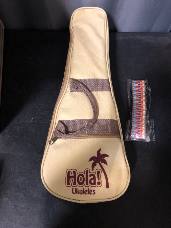 Photo 2 of Hola! Music HM-121MG+ Deluxe Mahogany Soprano Ukulele Bundle with Aquila Strings, Padded Gig Bag, Strap and Picks, Natural
