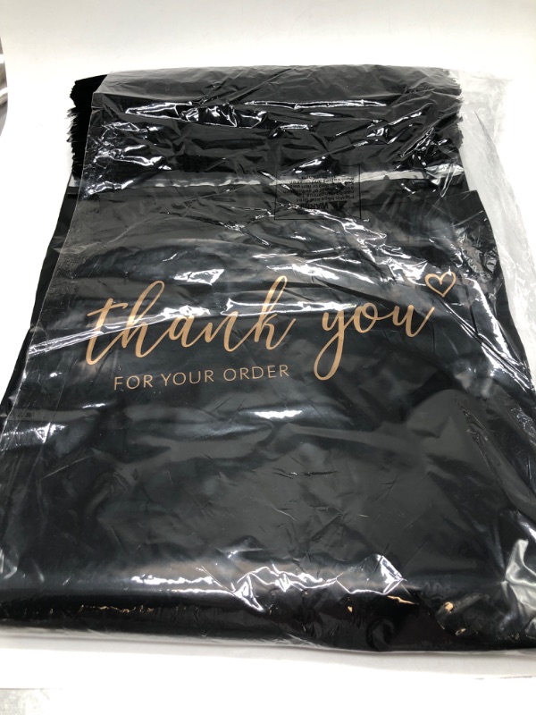 Photo 2 of JinRuiKJ Poly Mailers with Handle 10x13 Inch 100 Pcs, Easy to Carry Packaging Bags for Small Business, Thank You Shipping Bags with Self Adhesive Strip, Tearproof and Waterproof - Black