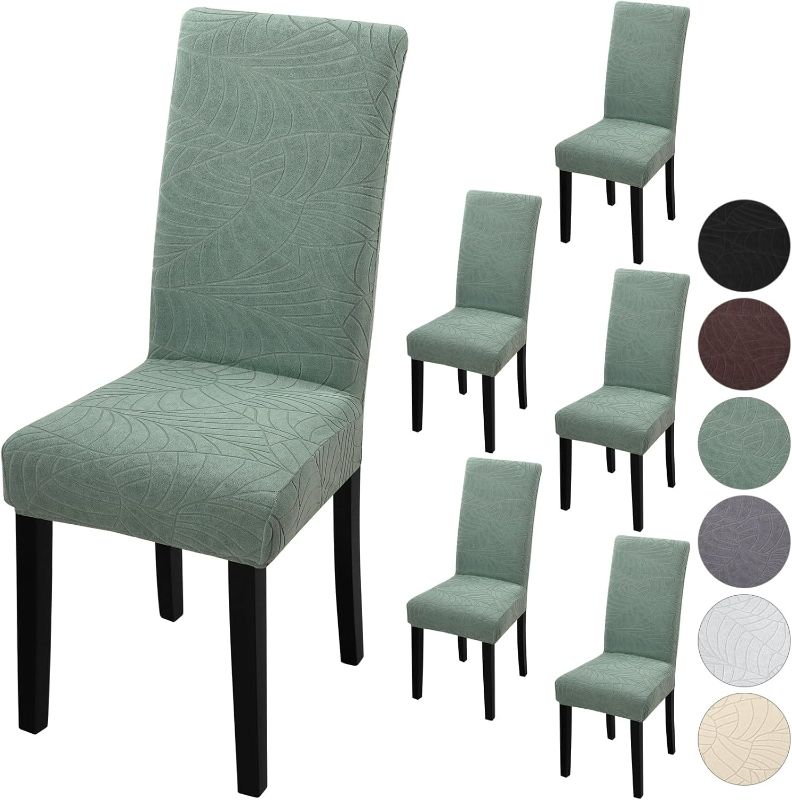 Photo 1 of Chair Covers for Dining Room 6 Pack, Solid Stretch Dining Chair Covers, Washable Kitchen Slip Covers, Jacquard Parson Chair Covers Set of 6(Leaf Jacquard Green, 6 Pack)