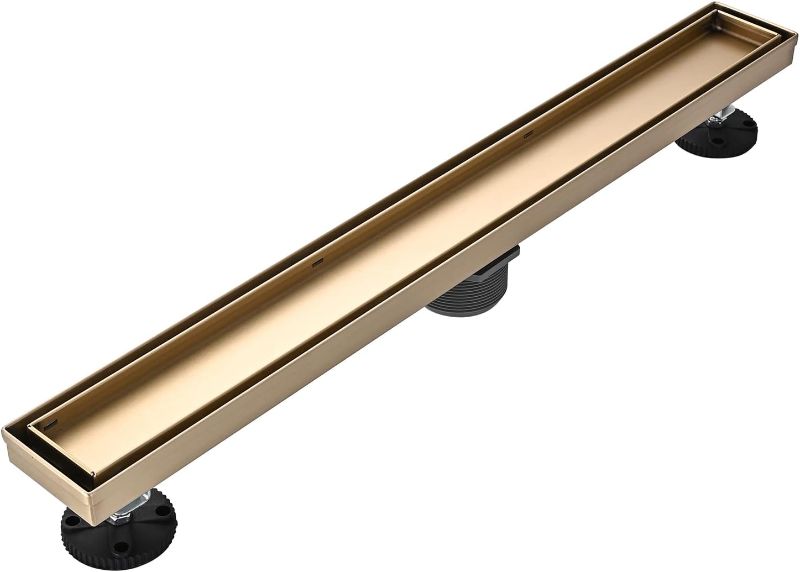 Photo 1 of Linear Shower Floor Drain, Brushed Gold 24 Inch 304 Stainless Steel Bathroom Drains Kit, Rectangular Shower Trench Drain with Reversable Tile-in Pattern Drain Cover & Hair Catcher
