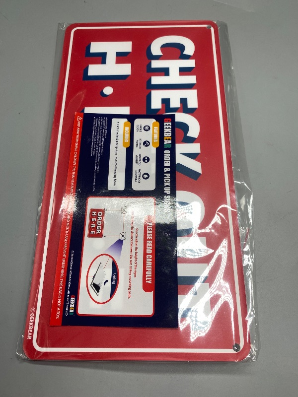 Photo 1 of GEEKBEAR Check Out Here Sign Hanging from Ceiling - 12 x 6 in (Red)
