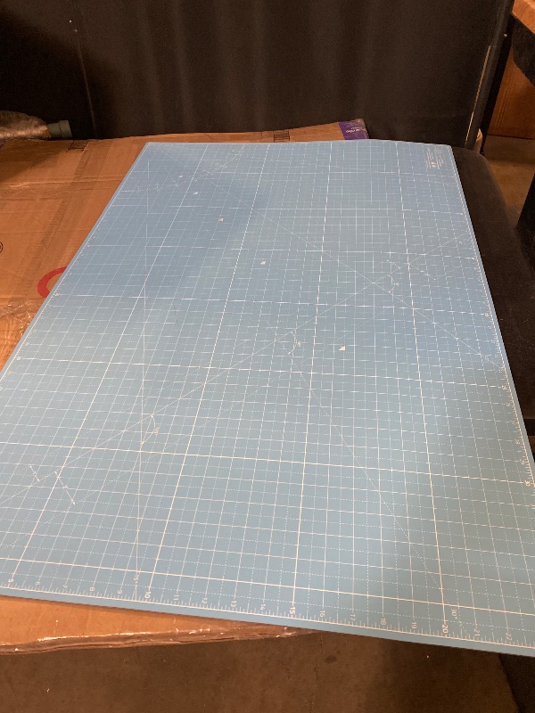 Photo 1 of Elan Cutting Mat A1 Blue, Large Self Healing Cutting Mat 24 x 36 Inch, 5-Ply Craft Board Blue, Hobby Board for Crafts 24x36 Inch
