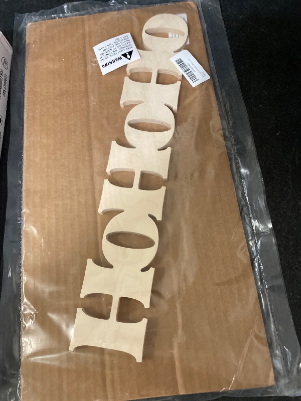 Photo 1 of Festive Wooden Sign - "HO HO HO" - Versatile Holiday Decor for Table, Wreaths, Doors, and Shelves
