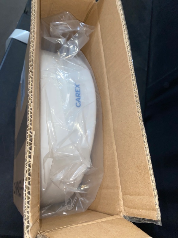 Photo 1 of Carex Toilet Seat Riser, Elongated Raised Toilet Seat Adds 3.5 inches to Toilet Height, for Assistance Bending or Sitting, 300 Pound Weight Capacity Toilet Riser