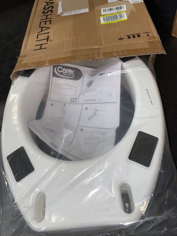 Photo 1 of Carex Toilet Seat Riser, Elongated Raised Toilet Seat Adds 3.5 inches to Toilet Height, for Assistance Bending or Sitting, 300 Pound Weight Capacity Toilet Riser