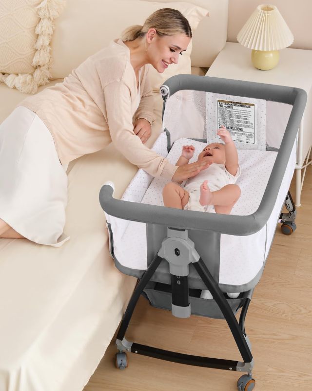 Photo 1 of Baby Bassinet, Bassinet Bedside Sleeper with Wheels, Breathable Mesh Bedside Bassinet for Baby, Mosquito Net, Storage Basket, 6 Height Adjustable, Easy to Fold, Grey

