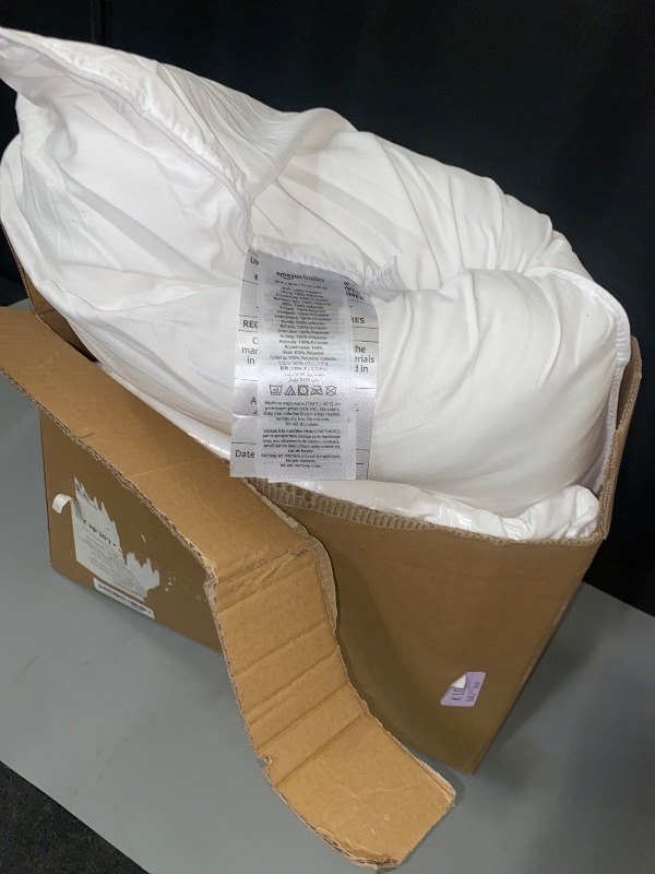 Photo 1 of Amazon Basics Down Alternative Pillow for Back Side Sleepers, Medium Density, Standard Size, 26" x 20", 2-Pack, White