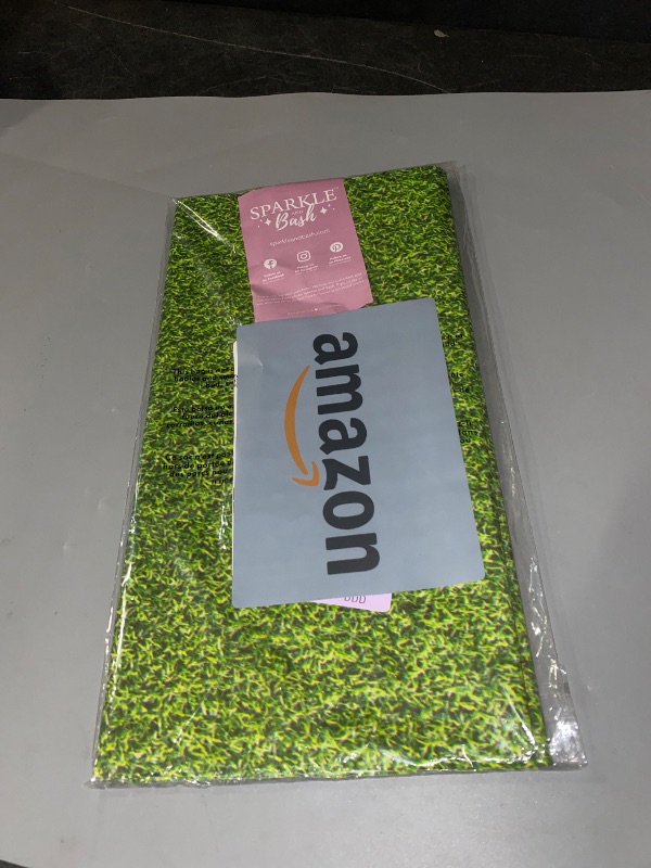 Photo 1 of Sparkle and Bash 3 Pack Green Grass Plastic Tablecloths (54 x 108 in) for Golf Party or Hole in One Birthday Table Covers & Decorations - Plastic Tablecloth - Table Cover