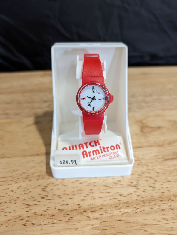 Photo 1 of Awatch by Armitron - Water Resistant Quartz - Red Band