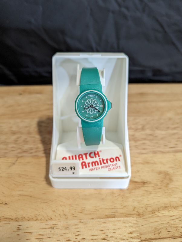 Photo 1 of Awatch by Armitron - Water Resistant Quartz - Green/Teal Band