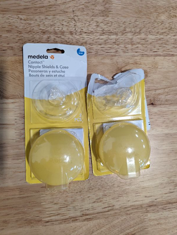 Photo 2 of Medela Contact Nipple Shield for Breastfeeding, 20mm Small Nippleshield, For Latch Difficulties or Flat or Inverted Nipples, 2 Count with Carrying Case, Made Without BPA, 3 Piece Set - 2 SETS
