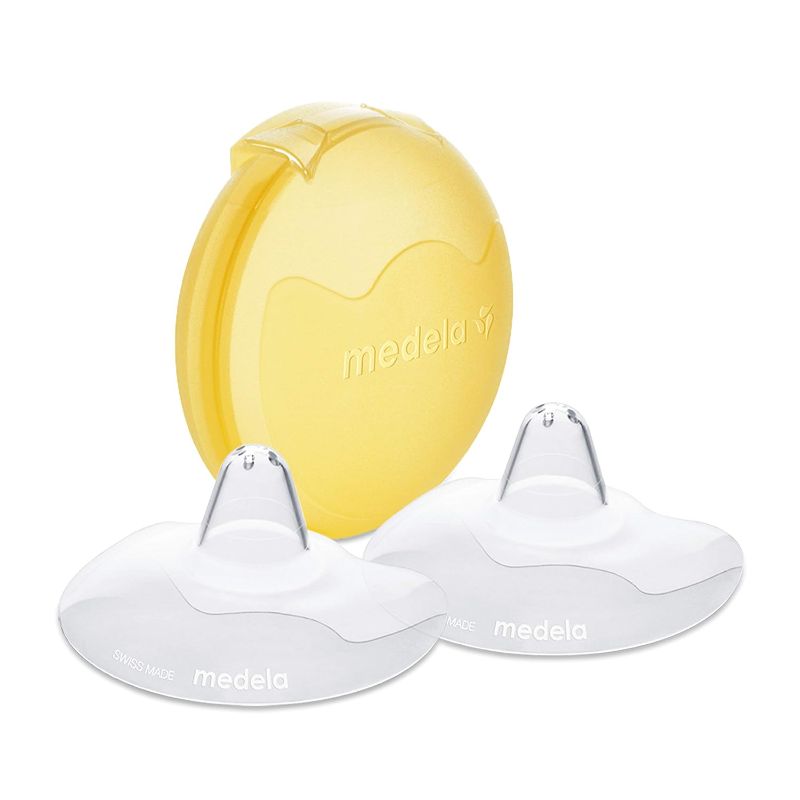 Photo 1 of Medela Contact Nipple Shield for Breastfeeding, 20mm Small Nippleshield, For Latch Difficulties or Flat or Inverted Nipples, 2 Count with Carrying Case, Made Without BPA, 3 Piece Set - 2 SETS
