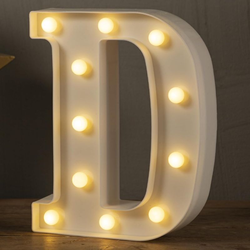 Photo 1 of HXWEIYE 9 " Inch Light Up Letters D, LED Marquee Letters Lights Sign Big Lights Letter for Party Birthday Bar Battery Powered Christmas Decor Letter Lights (Warm White)
