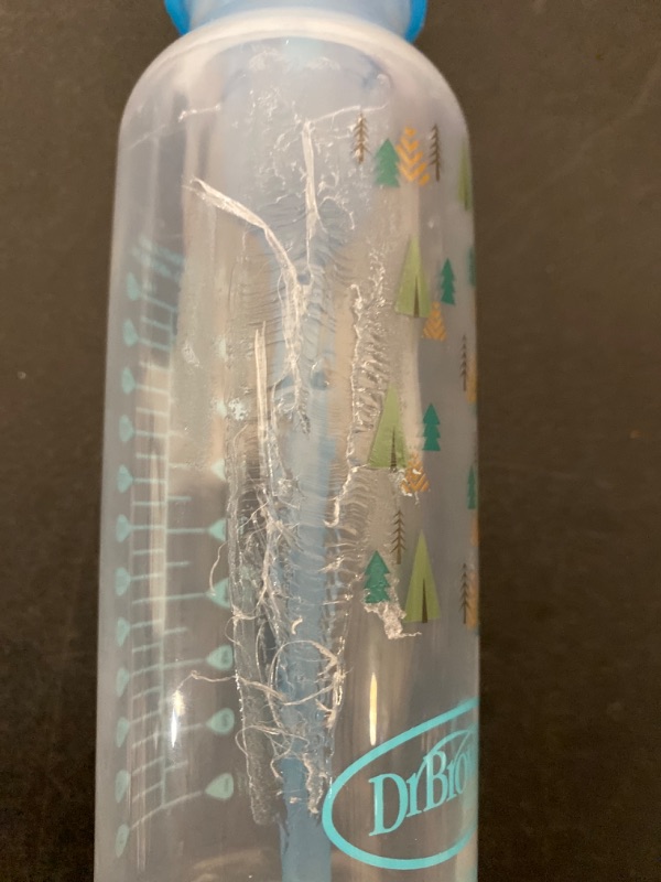 Photo 1 of Dr. Brown’s Natural Flow® Anti-Colic Options+™ Narrow Baby Bottles 8 oz/250 mL, with Level 1 Slow Flow Nipple, 4 Pack, Blue Nature & Triceratops Lovey with HappyPaci Pacifier, 0m+- MINOR DAMAGE
