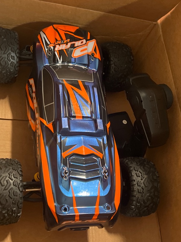 Photo 3 of MONGMA HOSPEED 1/8 RC Car,Big Off-Road RC Trunk,Max 45KPH,2 Batteries,25mins+ Play Time,Large Fast 2x2 Radio Control Remote,IPX4 Waterproof,Gifts for Kids or Adults(Orange)
