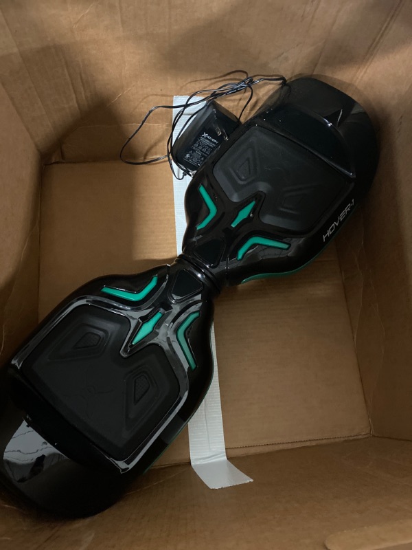 Photo 2 of Hover-1 Superfly Electric Hoverboard, 7MPH Top Speed, 6 Mile Range, Long Lasting Li-Ion Battery, 5HR Full Charge, Built-In Bluetooth Speaker, Rider Modes: Beginner to Expert, Black