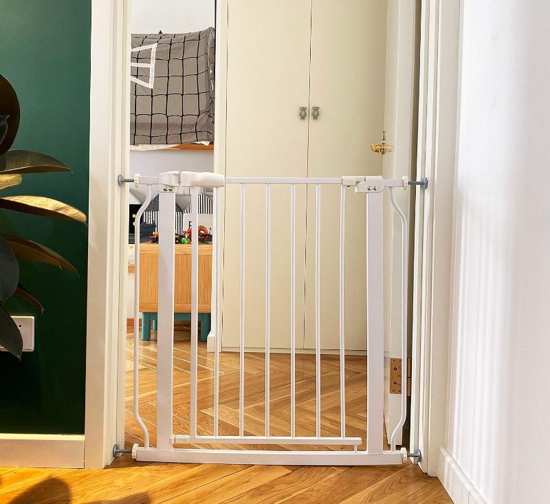 Photo 1 of BalanceFrom Easy Walk-Thru Safety Gate for Doorways and Stairways with Auto-Close/Hold-Open Features, 30-Inch Tall, Fits 29.1 - 33.8 Inch Openings, White