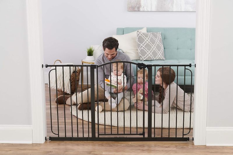 Photo 2 of Regalo 58-Inch Home Accents Super Wide Walk Through Baby Gate, Includes 6-Inch, 8-Inch and 12-Inch Extension, 4 Pack of Pressure Mounts and 4 Pack of Wall Cups and Mounting Kit