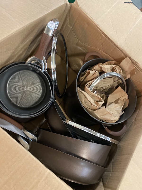 Photo 2 of Amazon Basics Non-Stick Cookware 8-Piece Set, Pots and Pans, Black
