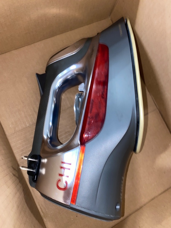 Photo 2 of CHI Steam Iron for Clothes with 8’ Retractable Cord, 1700 Watts, 3-Way Auto Shutoff, 400+ Holes, Professional Grade, Temperature Control Dial, Titanium Infused Ceramic Soleplate, Silver USED***