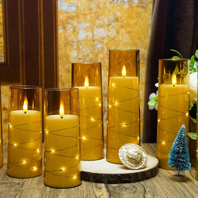 Photo 1 of Flameless LED Candles with Timer 9 Pc Flickering Flameless Candles for Romantic Ambiance and Home Decoration Stable Acrylic Shell,with Embedded Star String?Battery Operated Candles?Gold?
