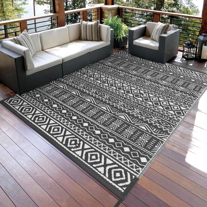 Photo 1 of Anidaroel Outdoor Rug 5'x8' Waterproof for Patio Decor, Reversible Plastic Straw Outdoor Area Rug, Stain & UV Resistant RV Camping Mat for Porch, Balcony, Pool Deck, Backyard, Gray&White
