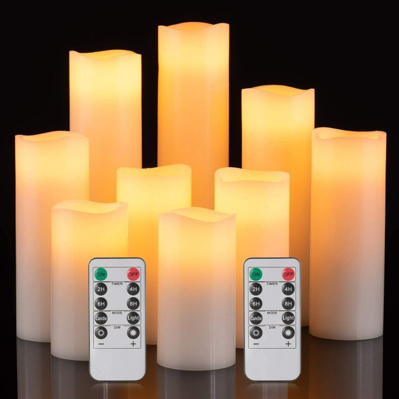 Photo 1 of Pillar Candles Set of 9, Ivory White Flameless Candles, Real Wax Realistic LED Candles with Remote, Electric Candles Flickering