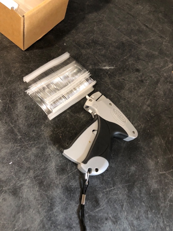 Photo 1 of Amram Comfort Grip Tagging Gun for Clothing, Gray Standard Tagger, 1,250 2-in Barbs Attachments, 5 Needles; for Manufacturers, Retailers, Consignment Sales, Yard Sales, Garage Sales
