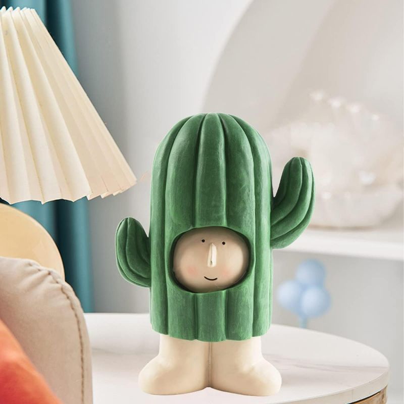 Photo 1 of Fangkun Resin Statues Sculpture Figurine Ornament, Boy and Cactus Home Decor Statues Sculptures Desktop Ornaments Modern Home Decorative Objects for Christmas Valentine's Day Bookcase Office Study
