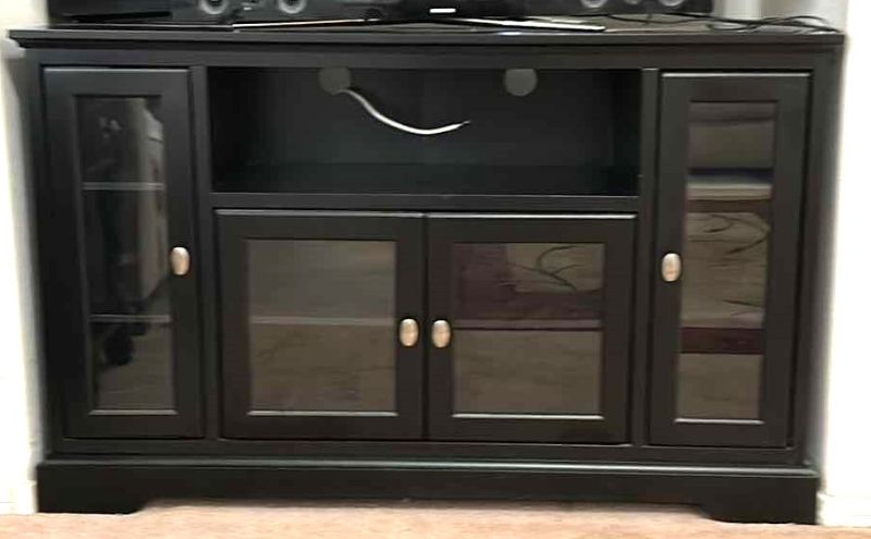 Photo 1 of BLACK WOOD ENTERTAINMENT CENTER (TV NOT INCLUDED) 52 1/2“ x 16 1/2“ high 32 1/2”