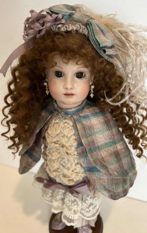 Photo 1 of GLOBAL DOLL (HAIR IS 100% MOHAIR) PORCELAIN DOLL ON STAND MOVABLE PARTS