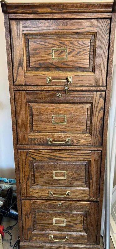 Photo 1 of LOCKING WOOD FILE CABINET WITY KEYS 90” x 28” x 53 1/2”